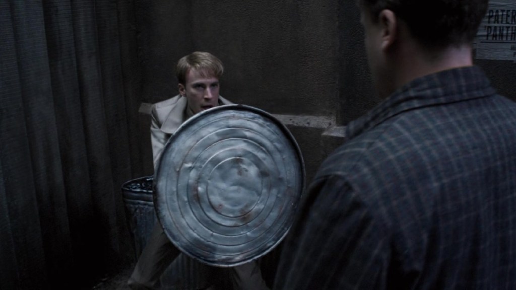 Steve Rogers using a trash can lid as a shield in Captain America: The First Avenger (2011)