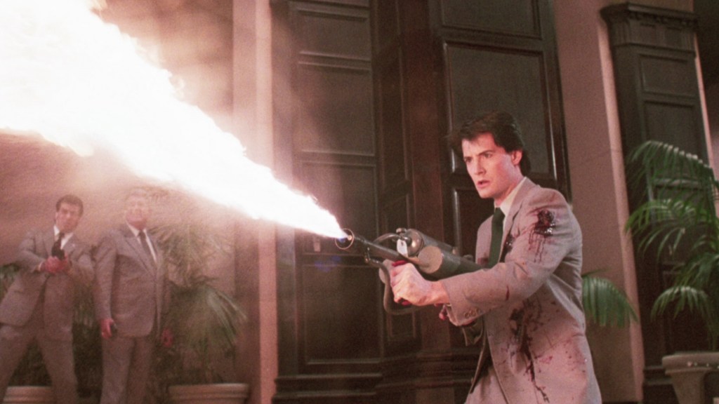 Kyle McLachlan with a flamethrower in The Hidden (1987)