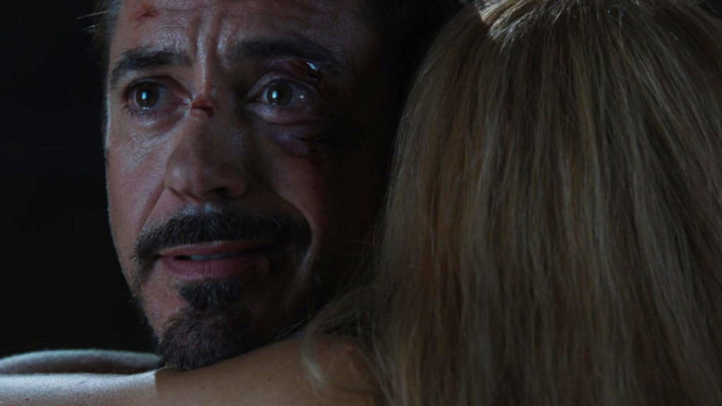 Tony Stark hugging Pepper Potts in Iron Man 3 (2013)