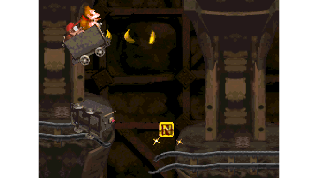 A screenshot from Donkey Kong Country, showing Donkey and Diddy Kong moving across a minetrack.