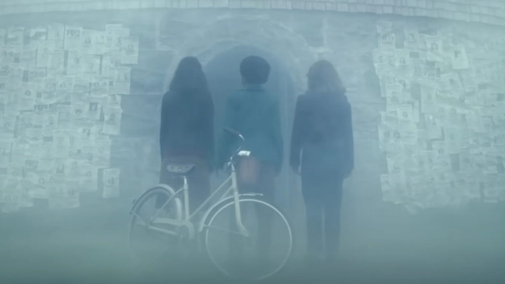 Lilly, Ronnie, and MArge looking at missing posters in IT Welcome to Derry