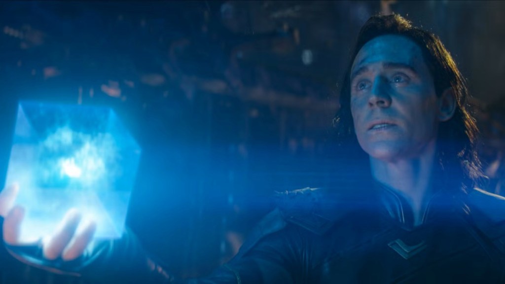 Loki holding up the Tesseract in Avengers: Infinity War