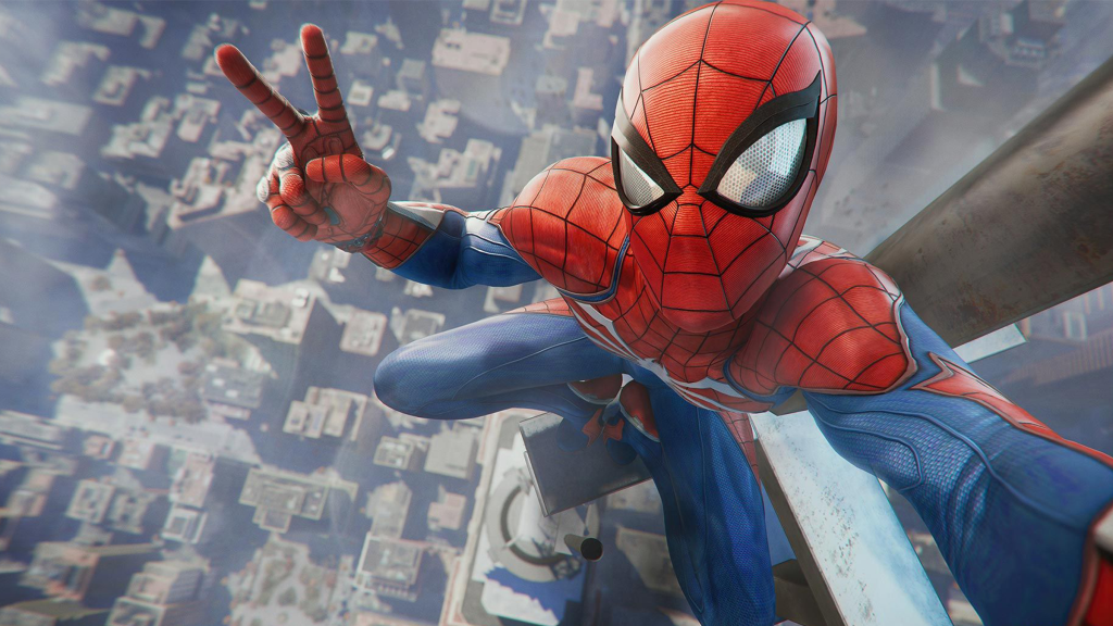 A screenshot from Marvelโs Spider-Man, showing Spider-Man atop a high building flashing a peace sign.