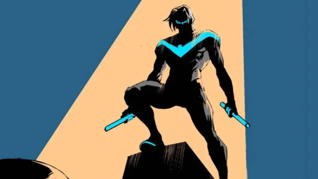 Nightwing standing in a spotlight
