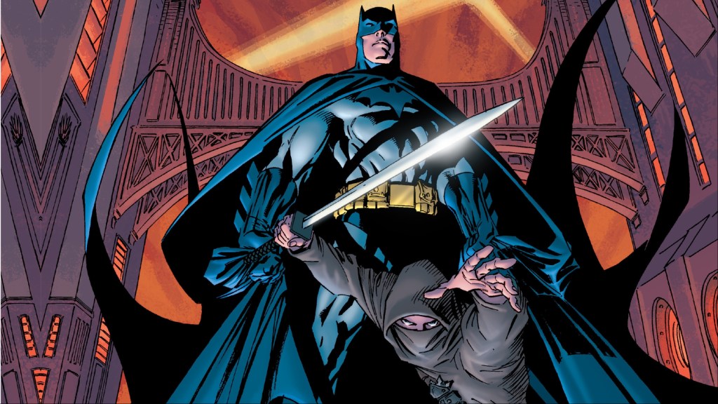Batman with a ninja Damian Wayne in front of him