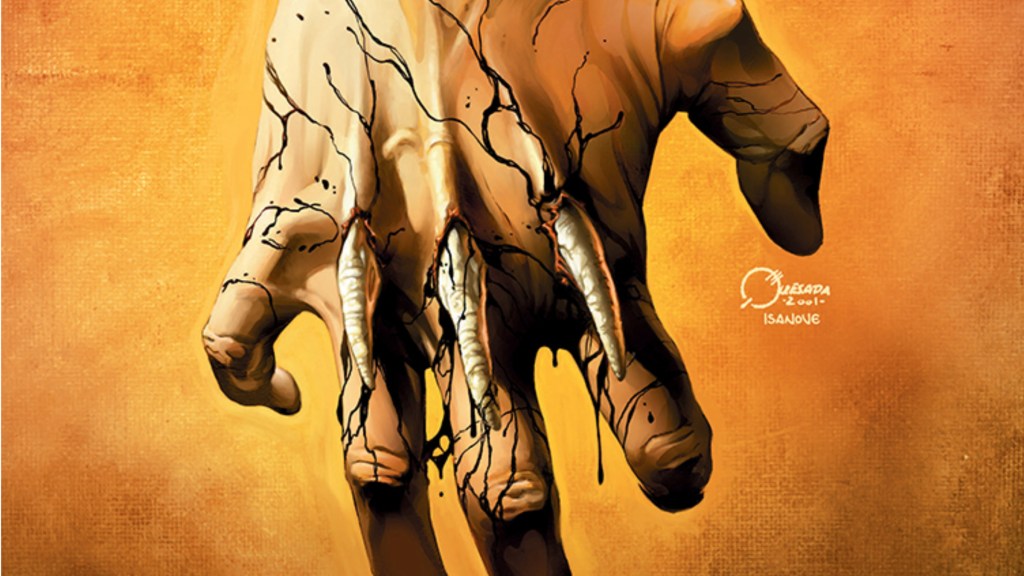 Logan's hand with claws poking through the skin