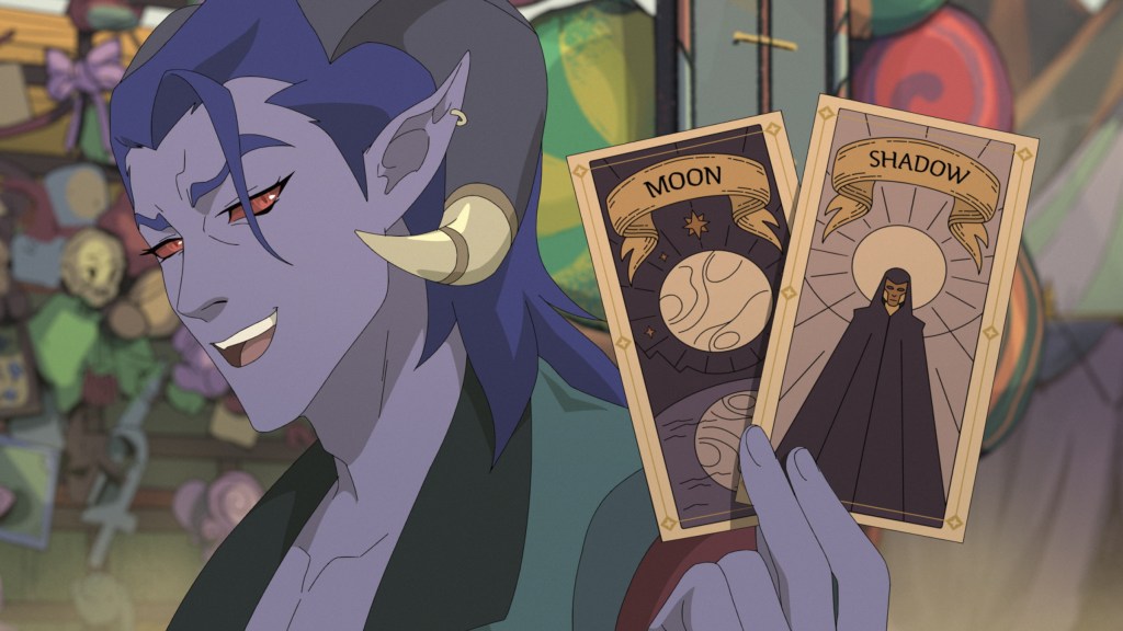 Mollymauk holding up tarot cards in The Mighty Nein