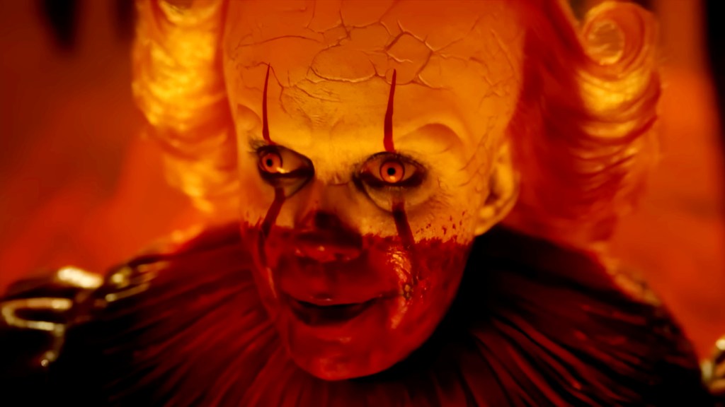 Pennywise (Bill Skarsgård) covered in blood in IT Welcome to Derry's Season 1 finale