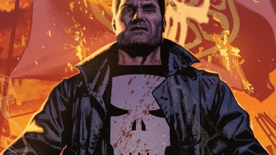 Punisher Standing with Flag Burning Behind Him