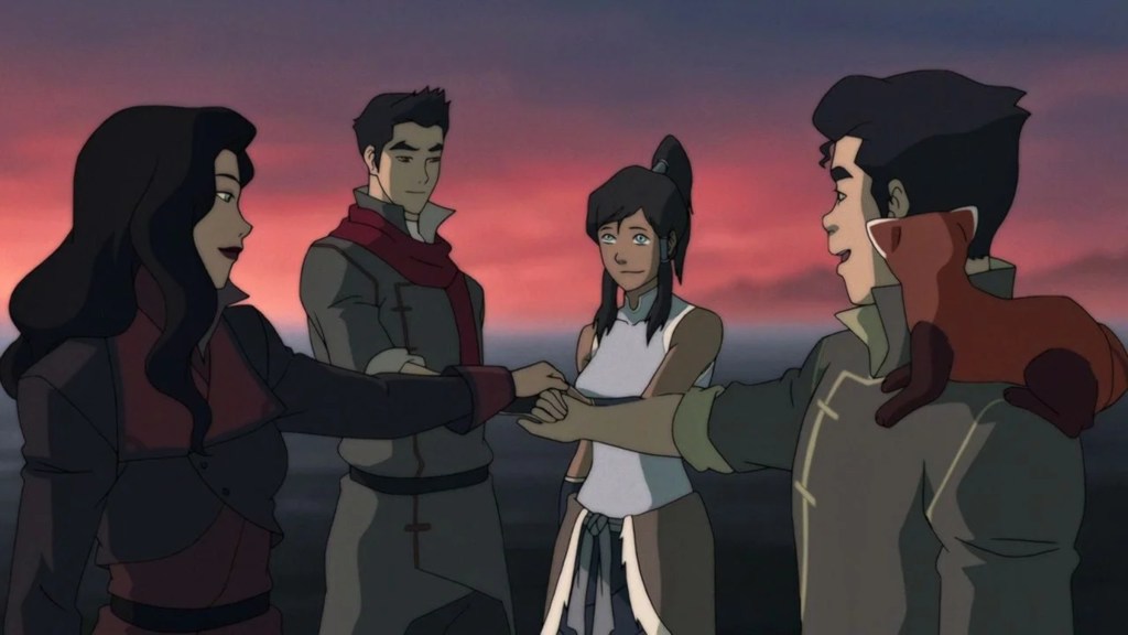 Team Avatar putting their hands together in a circle in The Legend of Korra