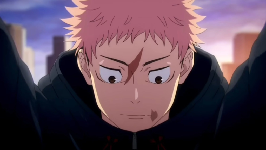 Yuji Itadori with a cut across his forehead in Jujutsu Kaisen