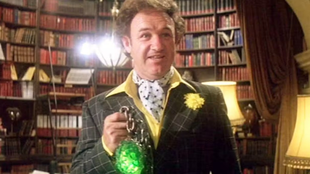 Gene Hackman as Lex Luthor holding kryptonite