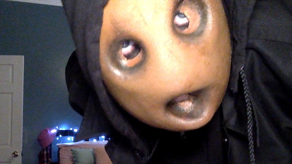 A masked killer in Strange Harvest (2025)