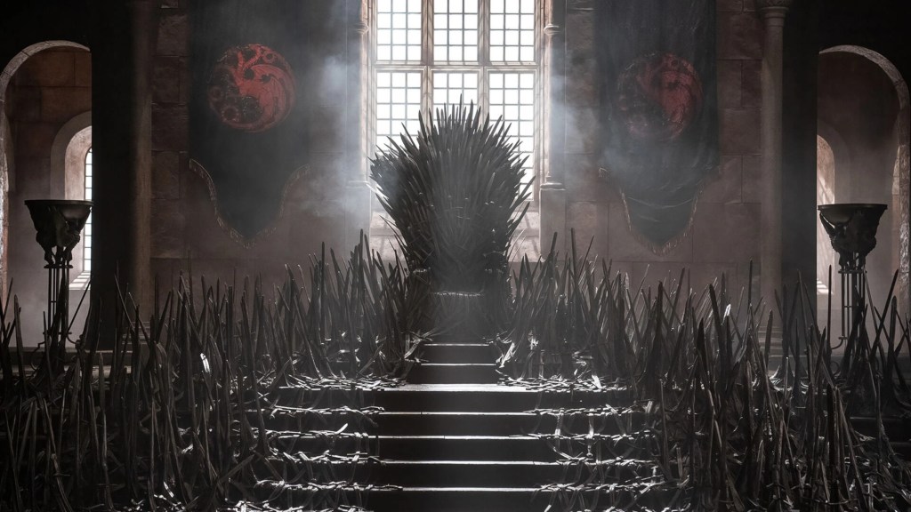 The Iron Throne surrounded by Targaryen flags in House of the Dragon