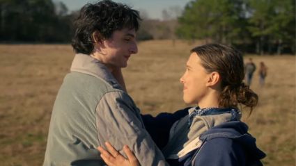 Mike and Eleven embracing.
