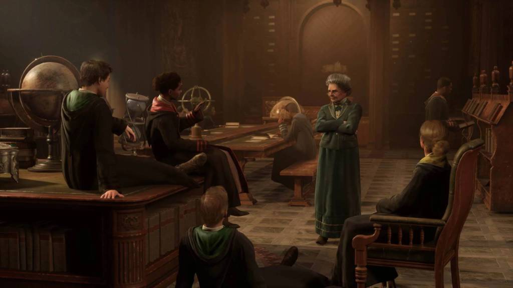 Students listening to a teacher in Hogwarts Legacy.