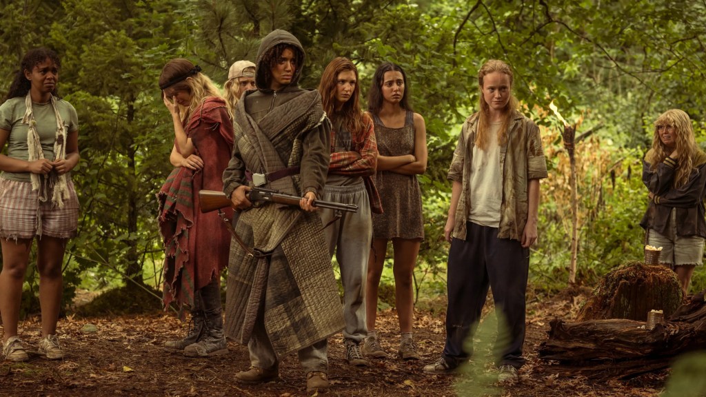 The teens in defensive poses in Yellowjackets Season 3