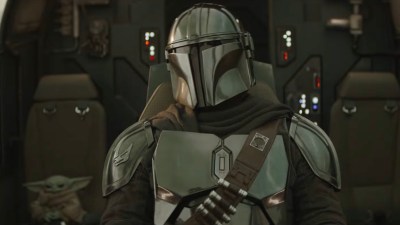 Din Djarin flying Razor Crest in Mandalorian and Grogu