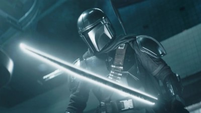 Din Djarin in The Mandalorian wielding the Darksaber.