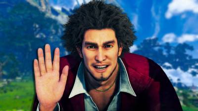Ichiban from Yakuza 7 holding his hand up with gameplay from Xenoblade Chronicles 2 behind him.