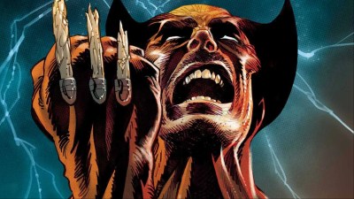 Wolverine holding up his broken claws