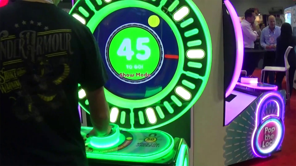 A man playing a Pop the Lock Machine.