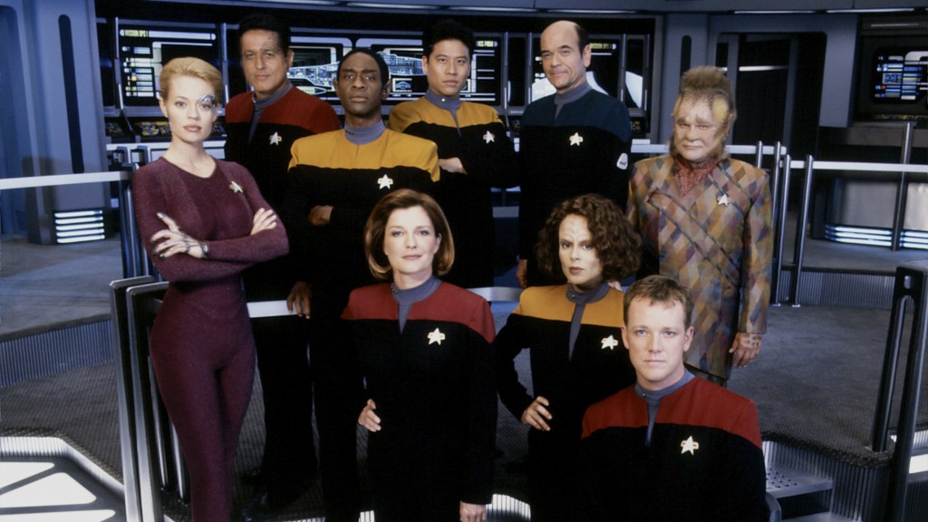 Star Trek Voyager Crew on Enterprise Bridge