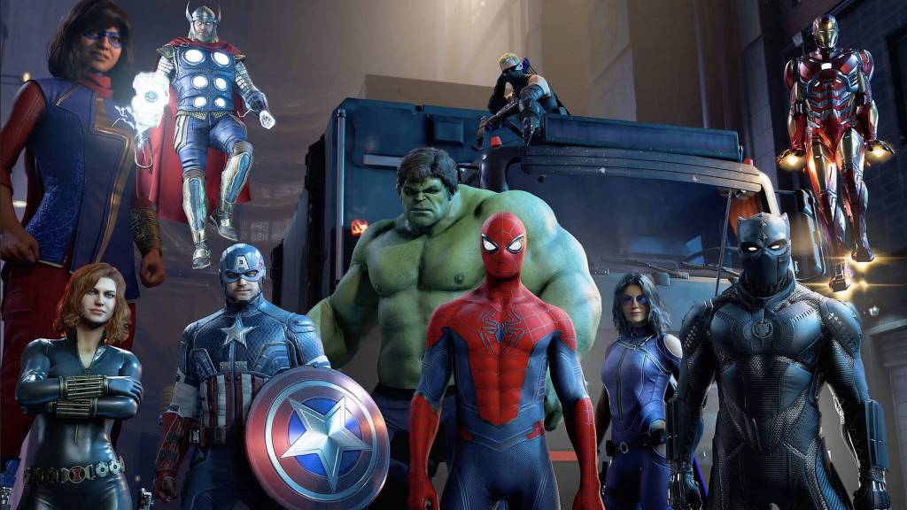 The cast of Marvel's Avengers standing in a warehouse.