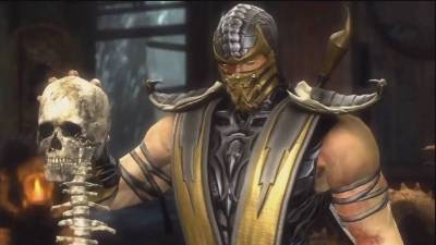 Mortal Kombat Scorpion holding Sub-Zero's skull