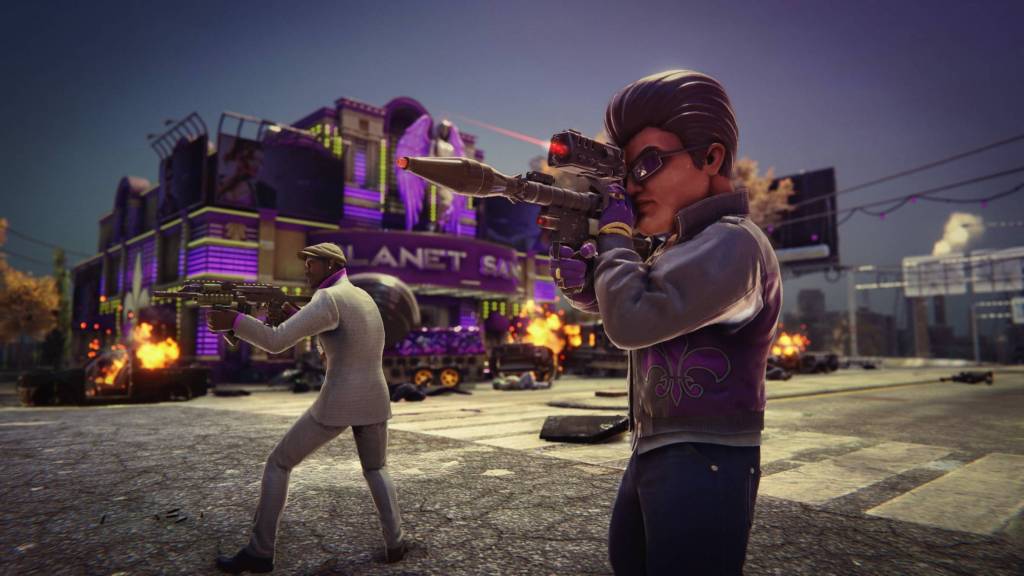 Characters holding guns in Saints Row 3 gameplay.