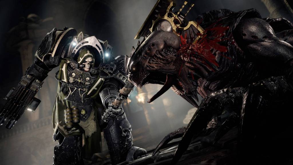 A terminator in Space Hulk: Deathwing killing a Tyranid.