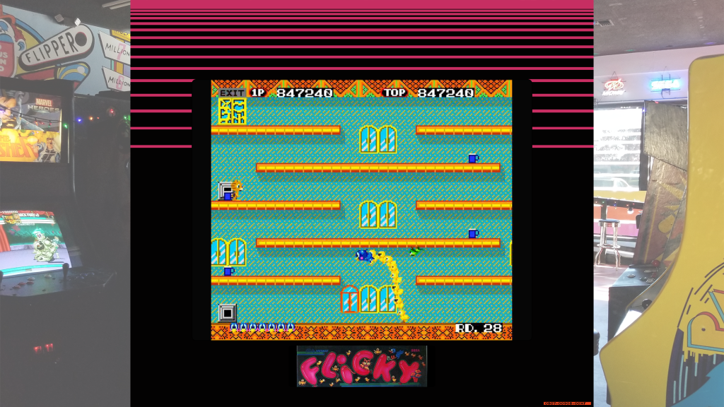 A screenshot from Flicky with arcade bezel art over a picture of Retrovolt Arcade.