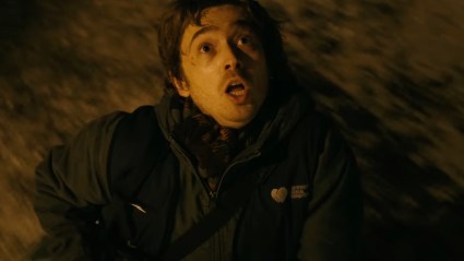 Bryan running down street in Resident Evil