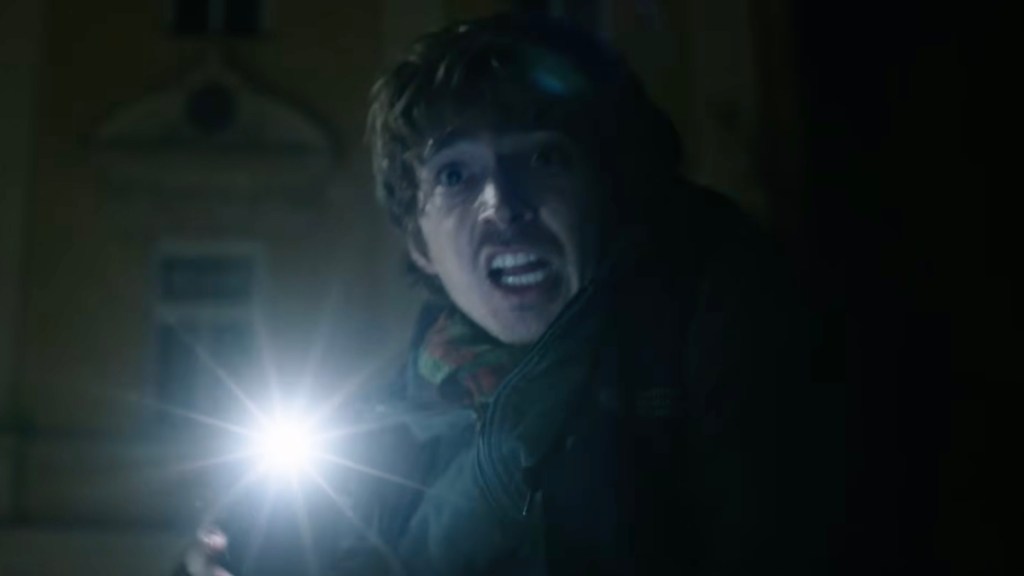 Bryan with flashlight in Resident Evil