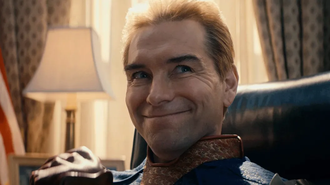 Homelander smiling while sitting in the Oval Office in The Boys Season 5