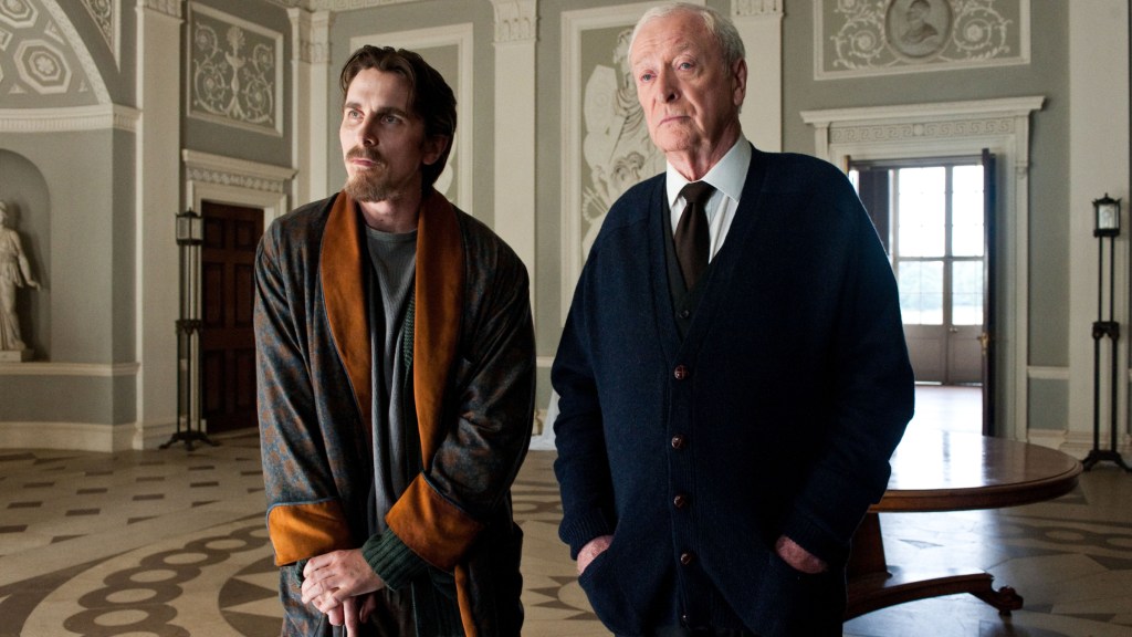Bruce Wayne and Alfred in The Dark Knight Rises