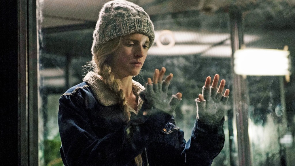 Prairie Johnson pressing her hands against glass in The OA
