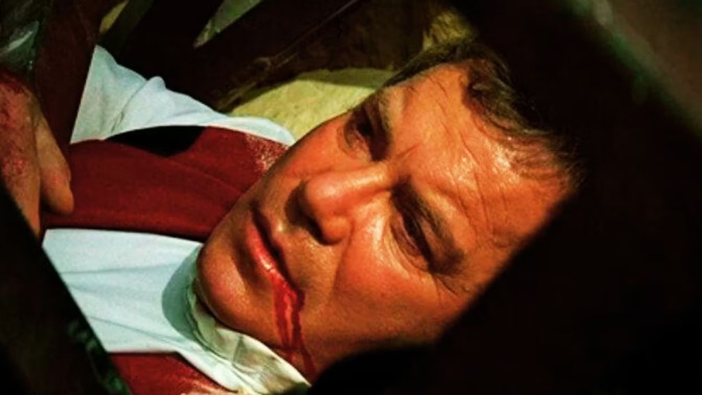William Shatner as James T. Kirk dying in Star Trek: Generations