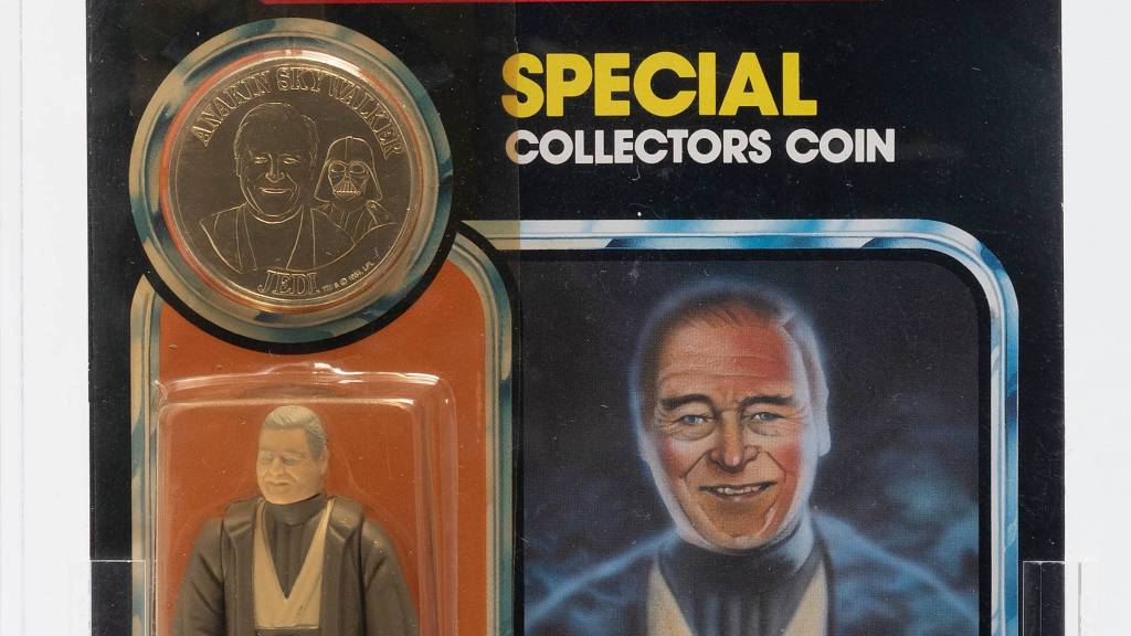 985 Kenner Power of the Force Anakin Skywalker action figure with a commemorative coin.