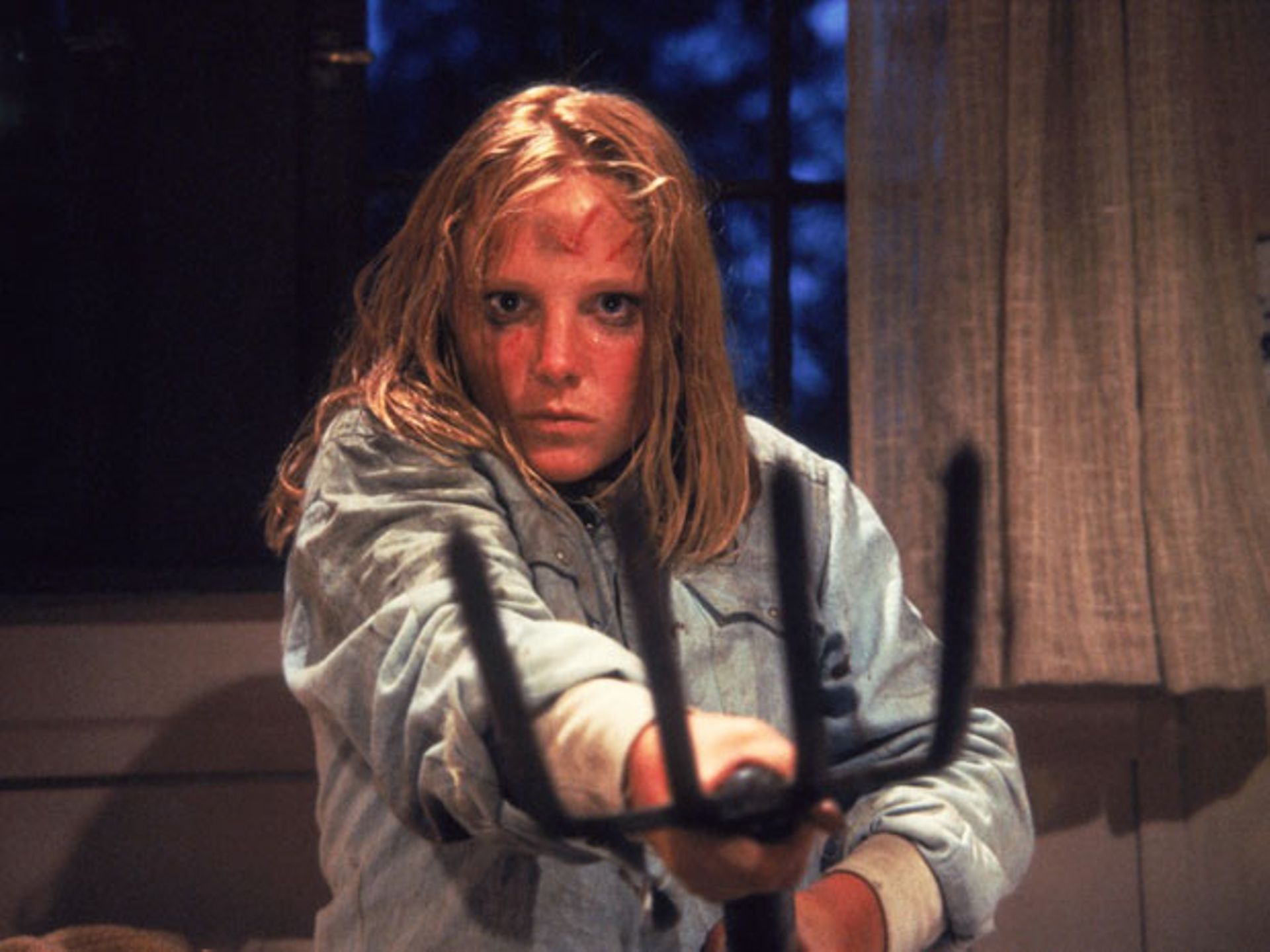 Amy Steel as Ginny Field.