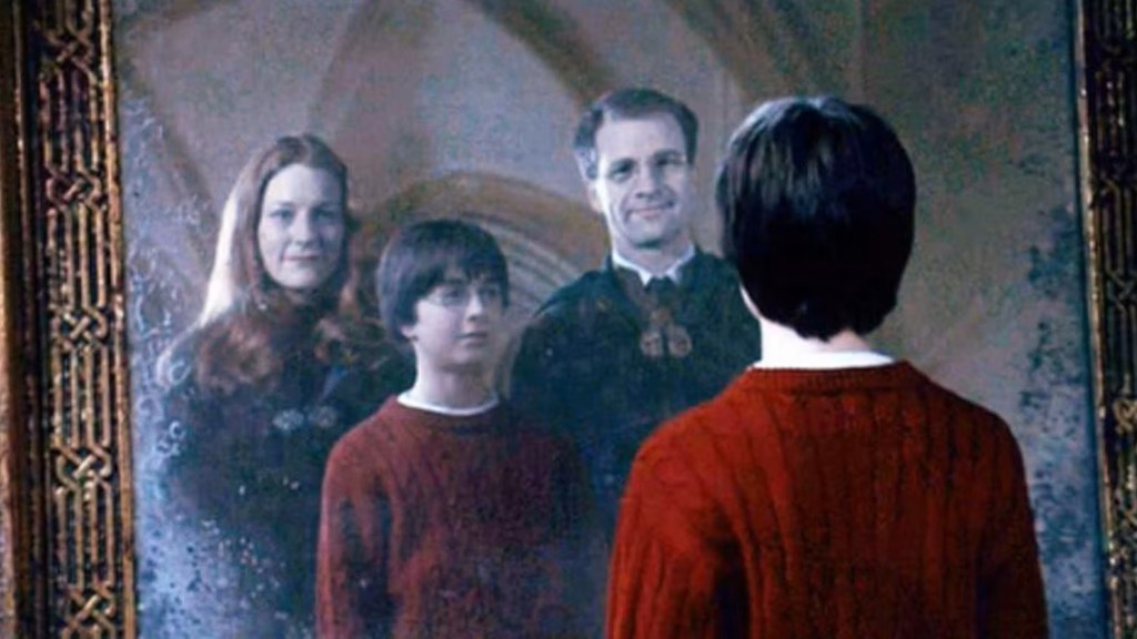 Harry Potter looking at his parents in the Mirror of Erised