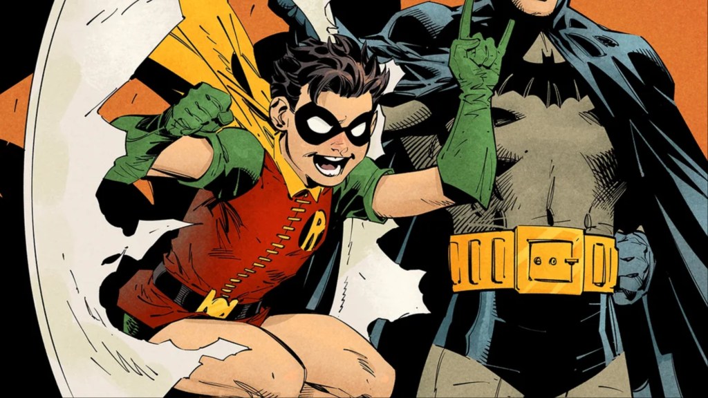 Robin jumping through a hoop, throwing up his devil horns