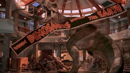 A shot from Jurassic Park, featuring the T-Rex roaring in front of a banner.