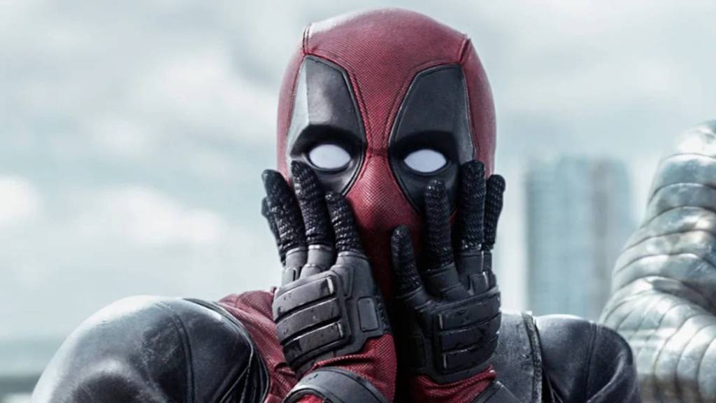 Deadpool covering his mouth in shock from the Deadpool movie.