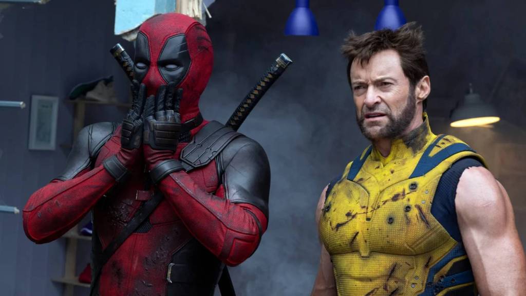 Deadpool looking shocked with Wolverine standing next to him in Deadpool & Wolverine..