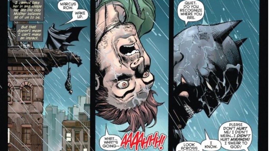 Batman interrogating a crook