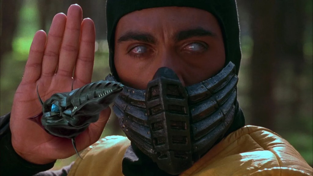 Scorpion in 1995's Mortal Kombat, an alien spear emerging from the palm of his hand.