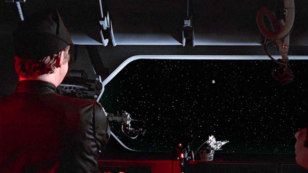 The Empire watching the droids' escape pod in Star Wars: A New Hope