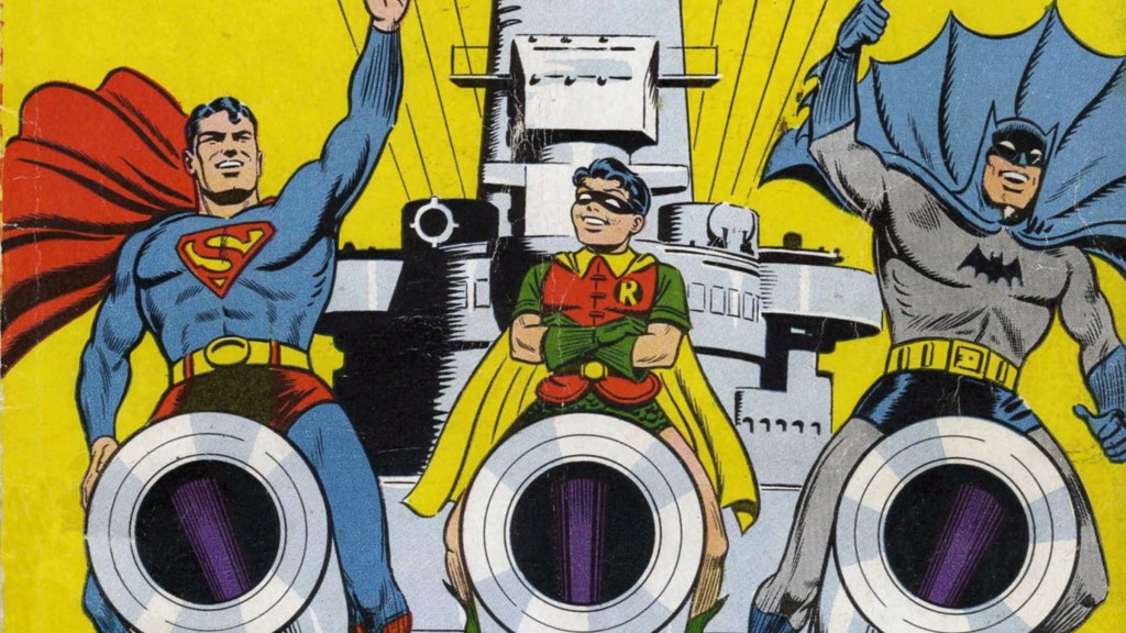 Superman, Batman,a dn Robin sitting on ship's cannons 