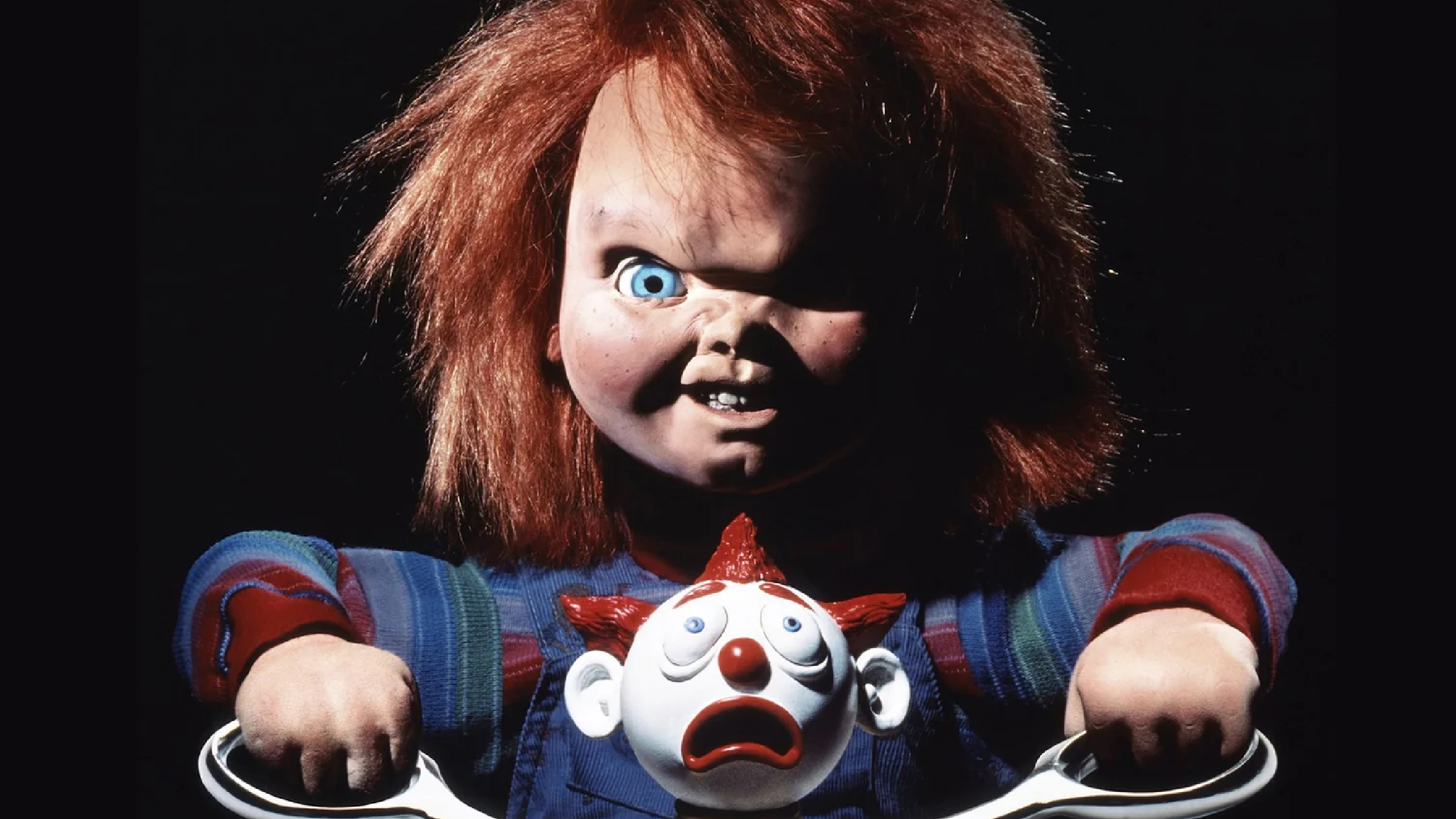 Chucky on the poster for Child's Play (1988)